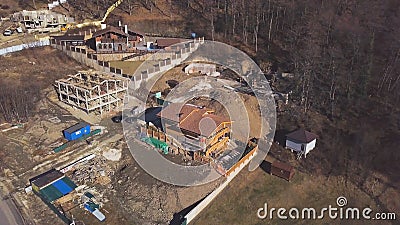 Top view of cottage under construction in country. Clip. Buildings in suburbs of private houses. Construction of private Stock Photo