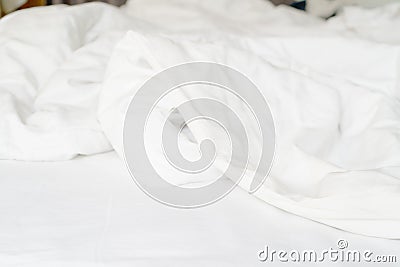 Top view of the crease of an unmade bed sheet in the bedroom after a long night sleep and waking up in the morning Stock Photo