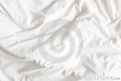 Top view of the crease of an unmade bed sheet in the bedroom. Stock Photo