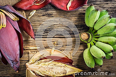 Top view Cultivated banana and banana blossom on the table. Stock Photo