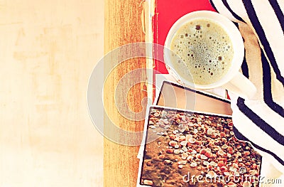 Top view of cup of coffe and stack of photos filtered image travel or vacation concept. Stock Photo