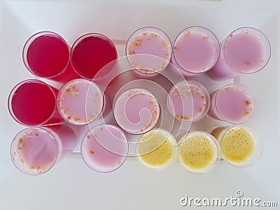 Top view of cups with colorful desserts Stock Photo