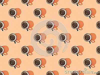 Top view of cups of fresh coffee on orange Stock Photo