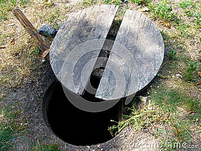 Open sewer manhole Stock Photo