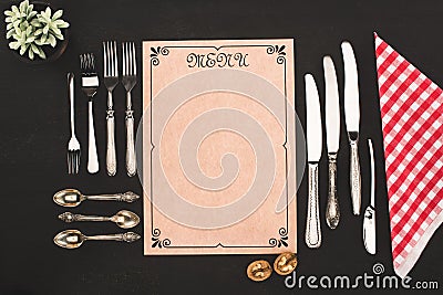 top view of decorative blank menu and vintage cutlery Stock Photo