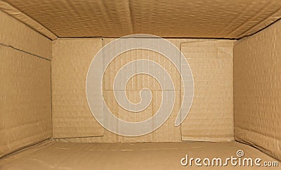 Top view of deep empty cardboard box, opened brown paper carton box, empty cardboard box close up, inside view Stock Photo