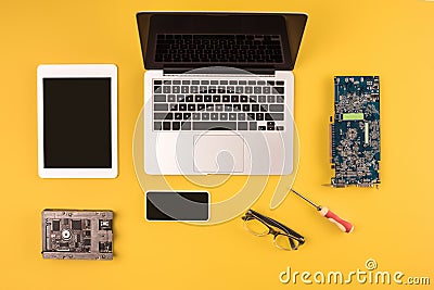 top view of digital devices with black screens and motherboard and hardware Stock Photo