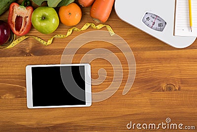 Top view, digital tablet on a wooden table Stock Photo