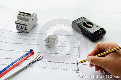 Top view of electrical tools and materials for electrical system, cable and cable ties, breakers, led bulb and Multi-meter Stock Photo