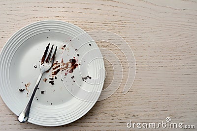 Top view of an empty plate with fork in it. Stock Photo