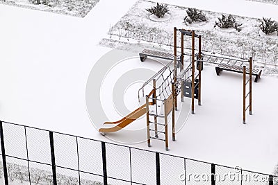 Top view of empty slide on winter Playground covered with snow Stock Photo