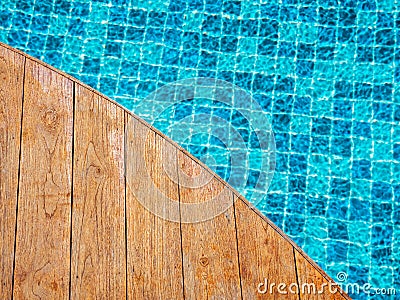 Top view of empty wooden plank table or deck floor curved shape in front of the blurred background. Stock Photo