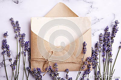 Top view envelope with blank paper sheet and lavender. Love letter, wedding concept Stock Photo