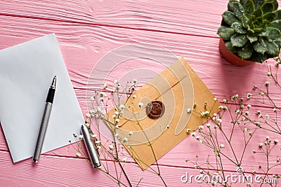 Top view envelope with seal and blank paper. Stock Photo