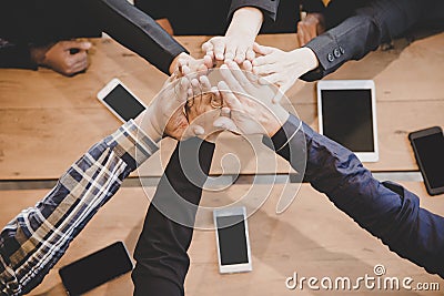 Top view executive business people group team happy showing teamwork and joining hands or giving five after meeting partner busine Stock Photo