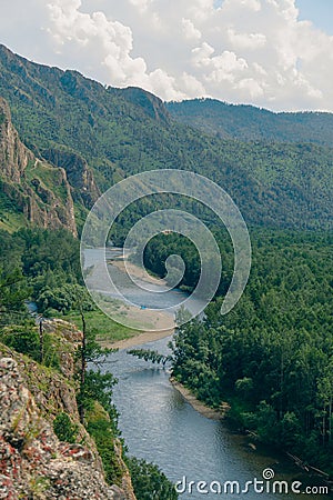 the fast mountain river bely ius in Khakassia on a hot summer day. Stock Photo