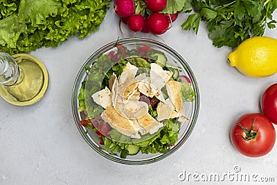 Top view of Fattoush salad in a bowl with ingredients Stock Photo