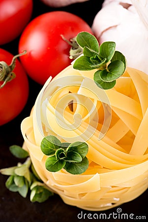 Top view on fettuccine portion with oregano Stock Photo