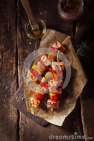 Top View of Fish Kebabs on a Wooden Table Stock Photo