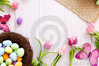 Top view and flat lay of conceptual arrangement decoration for Happy Easter holiday on wood background Stock Photo