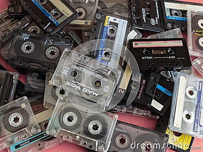 Stack vintage compact cassette tape, Close up set of old audio tapes Editorial Stock Photo