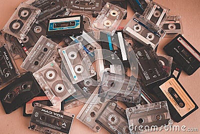 Stack vintage compact cassette tape, Close up set of old audio tapes Editorial Stock Photo