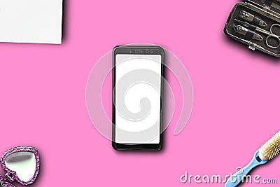 Top flat lay, top view manicure pedicure equipment on pink backgrounew black smartphone isolated on white background for mock up Stock Photo