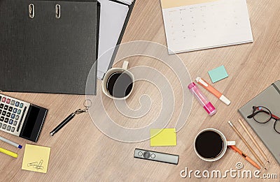 Top view folder, calculator ,calendar coffee and accessories on table with copy space center Stock Photo