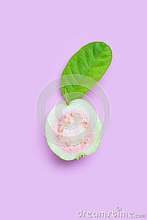 Top view of fresh ripe guava with leaf on pink Stock Photo