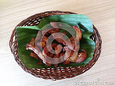 Top view of fried dried porks in the basket Stock Photo