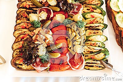 Top view of fruit and vegetable buffet table. Various types of fresh and grilled vegetable and fruit. Celebration Stock Photo