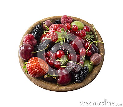 Top view. Fruits and berries in bowl on white background. Ripe currants, raspberries, cherries, strawberries, gooseberries, blackb Stock Photo