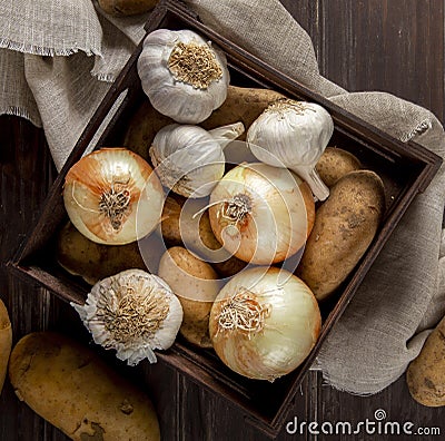 top view garlic onions crate. High quality photo Stock Photo
