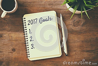 Top view 2017 goals list with notebook, cup of coffee Stock Photo