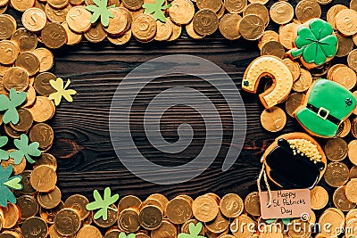 top view of golden coins and icing cookies on table, st patricks day concept Stock Photo