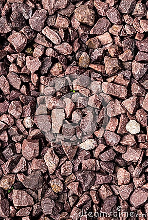 Top view of granite red tone gravel. Small colorful stone composition with space for text. Many different tiny rocks with view Stock Photo