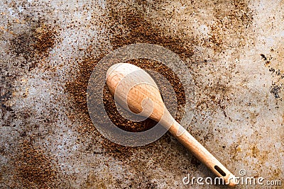 Ground Cloves Spilled from a Teaspoon Stock Photo