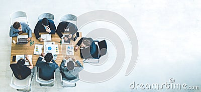 Top view on a group of businessman and businesswoman having a meeting and making a business commitment Stock Photo