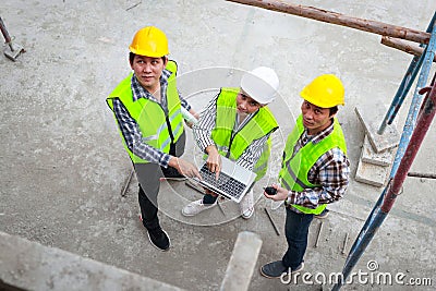 Top view of group of engineers, architects and contractors Stock Photo