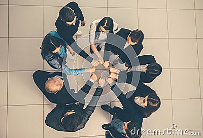 Top view. group of young professionals standing in a circle Stock Photo