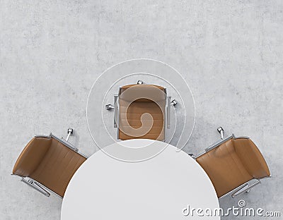 Top view of a half of the conference room. A white round table, three brown leather chairs. Office interior. Stock Photo