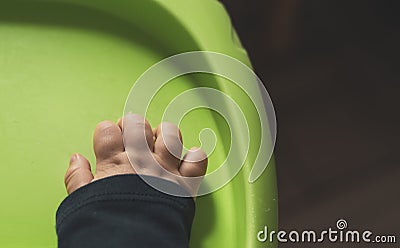 Top view of a hand of a newborn baby on the table Stock Photo