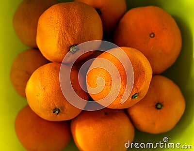 Top view , Healthy fruits, orange fruits green color background . Stock Photo