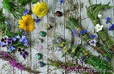 Top view of herbs, flowers and reiky crystals on wooden witch table Stock Photo