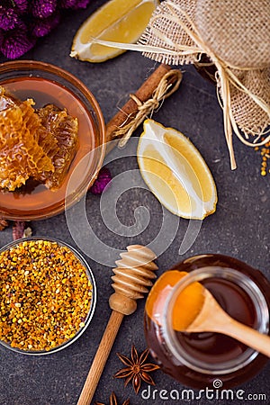 Top view of honeycomb, pollen, propolis, honey on the table Stock Photo