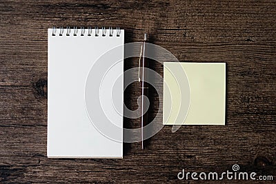 Top view image of blank notebook ,empty sticky note paper and pe Stock Photo