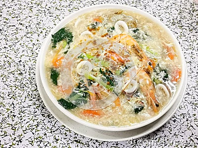 Top view image delicious wan tan ho. Chinese wet noodle seafood with eggs. Stock Photo