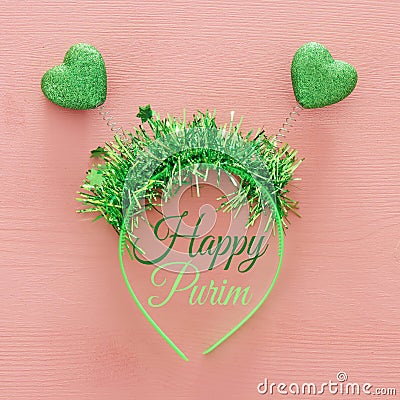 Top view image of funny party head glitter accessory with hearts. Flat lay. Purim celebration concept Stock Photo