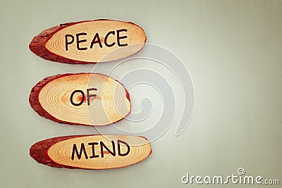 Top view image of wooden signs with the text peace of mind Stock Photo