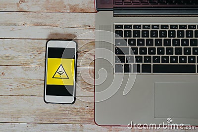 Top view of Insecure wifi connection icon on smart phone screen Stock Photo